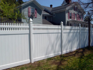 Vinyl privacy fence with victorian topper and gothic post caps